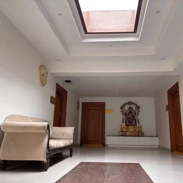 Lobby lounge beneath a skylight