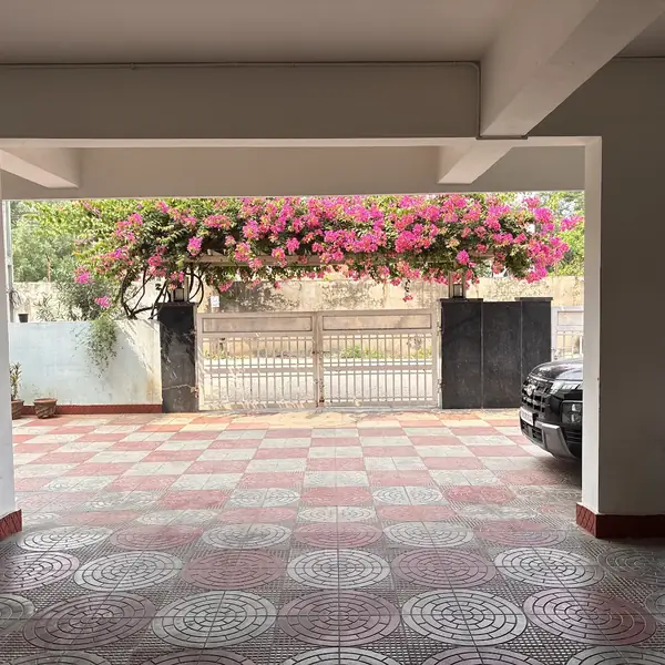 Covered parking, looking out to the gate